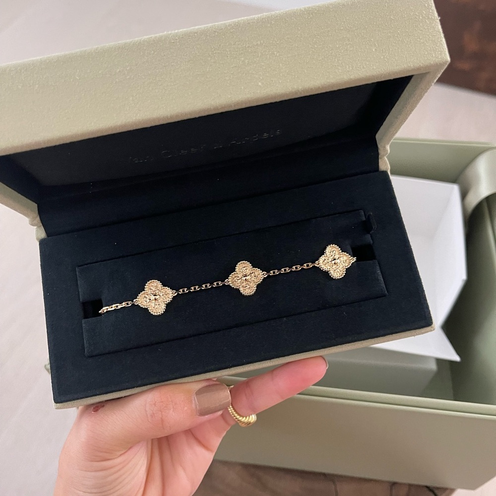 Vancleef & Arpels Vintage Alhambra bracelet 5 motifs textured 18K yellow gold.